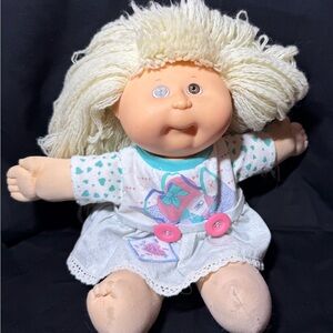 Adorable Cream Doll with Blonde Hair and Heart Dress